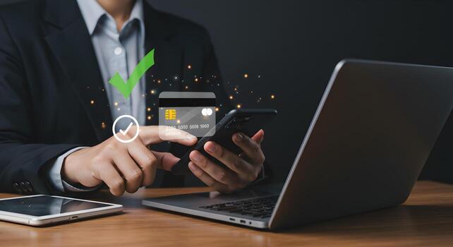 Businessman using smartphone for secure online payment confirming transaction with digital checkmarks at modern workplace concept of secure mobile banking and financial technology photo