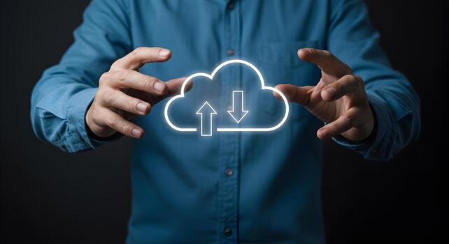 Man in blue shirt interacting with a digital cloud computing interface symbolizing data transfer and storage showcasing concepts of network technology and innovation photo