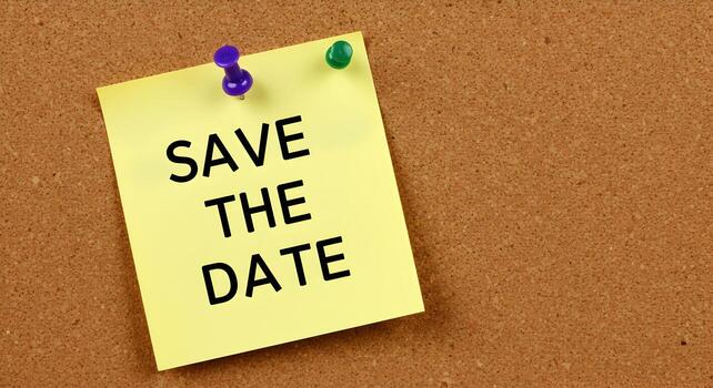 Yellow sticky note pinned to a corkboard with the text Save The Date written in bold black letters a reminder message for an important event or occasion photo