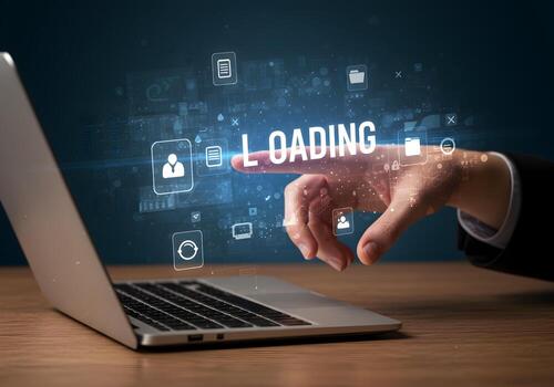 Hand interacting with digital interface showing loading process on laptop screen modern technology concept progress loading bar digital workspace data processing information technology network compute photo