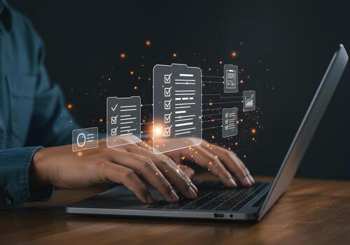 Person working on laptop with digital checklist and project management interface achieving business goals through effective task management and planning The image conveys efficiency productivity and s photo