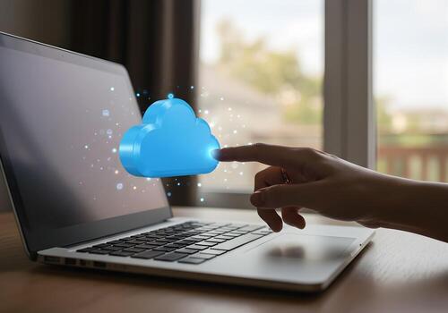 Woman using laptop computer accessing cloud computing services working from home office digital technology concept The image depicts a hand interacting with a 3D cloud icon symbolizing seamless online photo