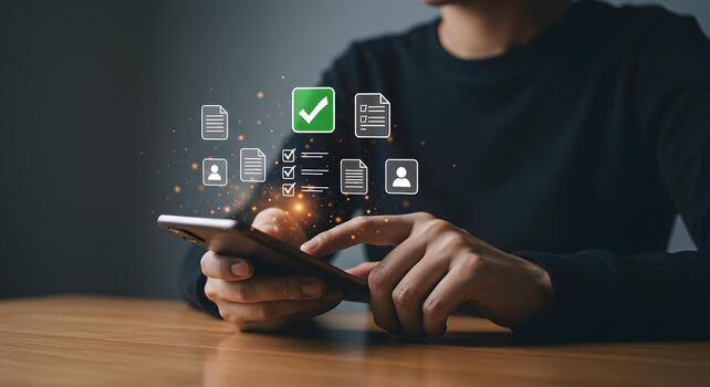 Person using smartphone to manage tasks and checklist efficiently accomplishing goals with digital organization at a wooden desk in a modern office representing productivity and success photo