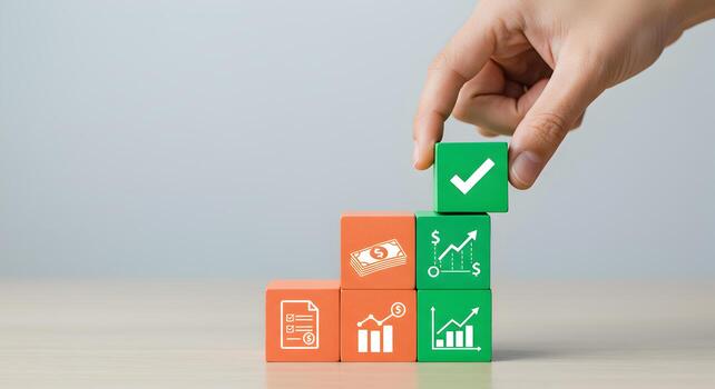 mano colocación un verde marca de verificación bloquear en un apilar de vistoso bloques simbolizando financiero crecimiento éxito y planificación en un escritorio foto