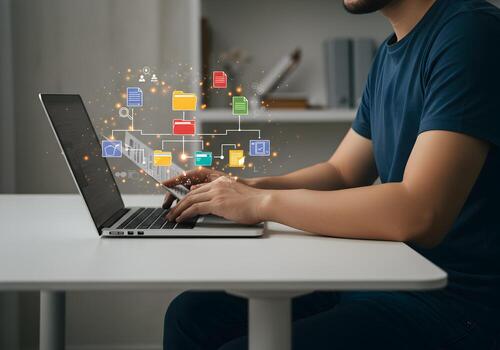 Man Working on Laptop with Digital Documents and Data Flow Visualization in Modern Office Setting Concept of Data Management and Digital Workflow photo