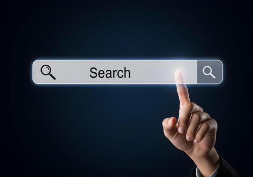 Hand using index finger to touch a glowing search bar with magnifying glass icons on a dark blue background Concept of internet search exploration discovery and finding information online photo