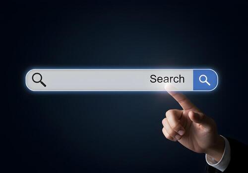 Hand using index finger to touch search bar with magnifying glass icon exploring digital world and searching information online concept of exploring and finding data photo