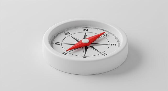 Red compass needle pointing North on a white background symbolizing guidance direction and the journey ahead This minimalist image evokes a sense of exploration and new beginnings perfect for concepts photo