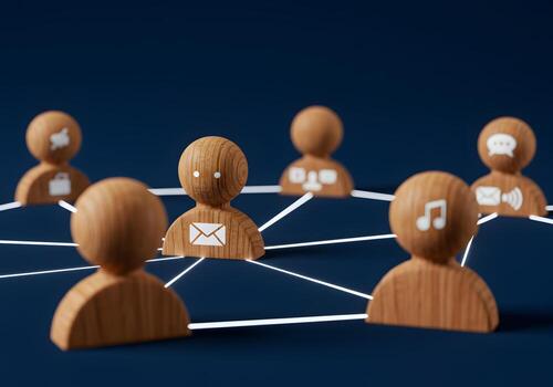 Wooden figures representing a social network connecting through glowing lines symbolizing communication and digital interaction in a modern online community photo