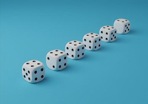Five white dice in a row on a blue background representing chance luck gambling or a game of chance The image evokes a sense of uncertainty and risk making it ideal for projects related to betting gam photo
