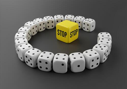 Stop Sign Dice in a Circle Surrounding a Yellow Dice - Concept of Decision Making Risk and Making a Choice photo