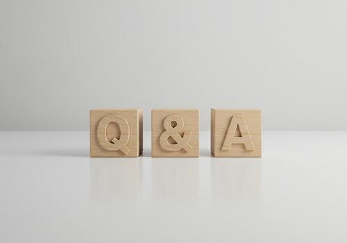 Wooden Blocks Spelling QA on White Surface Questions and Answers Concept Image photo