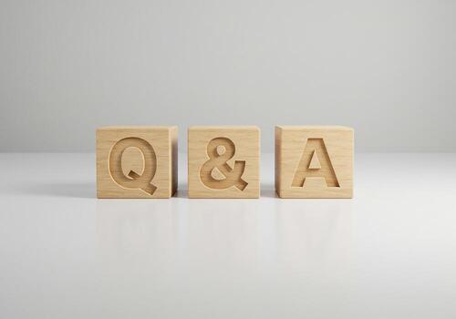 Wooden Blocks Spelling QA on White Surface Questions and Answers Concept photo