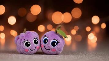 Adorable Plush Plums with Happy Faces and Bokeh Lights Create Whimsical Charm. video
