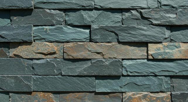 Stone cladding wall texture with slate rock brick pattern background photo