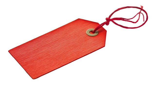 A close up of a red tag with a string attached isolated on a white background in a studio shot photo