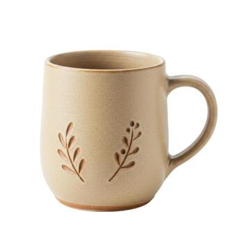 A simple ceramic mug with a handle and leaf design isolated on a white background in a studio setting photo