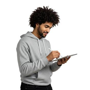 Man with afro using a stylus on a tablet wearing a gray hoodie on a white background in a studio shot photo