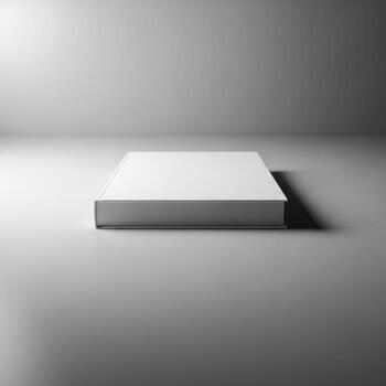 A clean modern white mattress with a subtle grey border rests on a minimalist surface isolated on white background photo