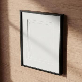 A simple black framed square picture frame with a blank white paper insert isolated on white background photo