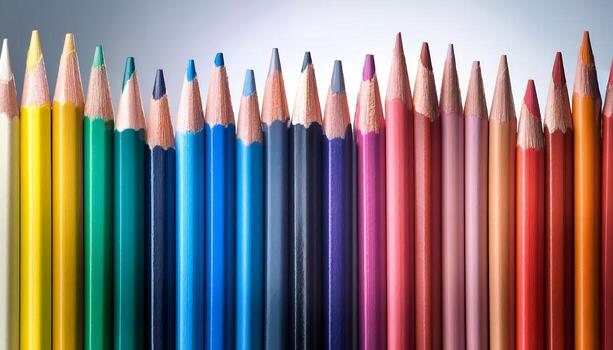 Colorful pencils arranged in a row. photo