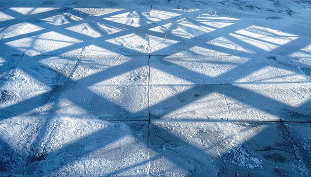 Frost shadow lattice cast on concrete cool tones headline area wallpaper representing winter light pattern suitable for modern minimal design photo