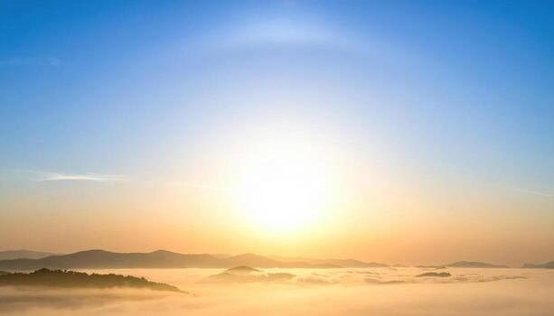 Low sun crepuscular rays through thin haze expansive sky gradient wallpaper background representing atmospheric light suitable for natural sky design photo