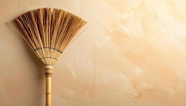 Unbranded broom corn bristle fan straw neutrals open space wallpaper background representing household craft object suitable for clean editorial and product design photo
