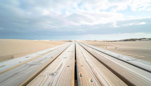 Boardwalk planks aligned to a vanishing edge pale timber tones open zone representing wooden deck texture suitable for clean coastal design photo
