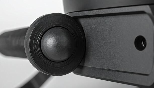Close up of kinematic mirror mount adjustment screw and ball seat matte black representing precision optics hardware suitable for scientific product design photo