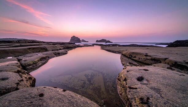 Tidal pool meniscus line on smooth rock pastel coastal palette uncluttered background representing shore detail suitable for serene seascape and editorial design photo