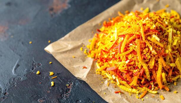 Citrus zest sprinkles on parchment fresh pops of color with open top copy space bright culinary background photo