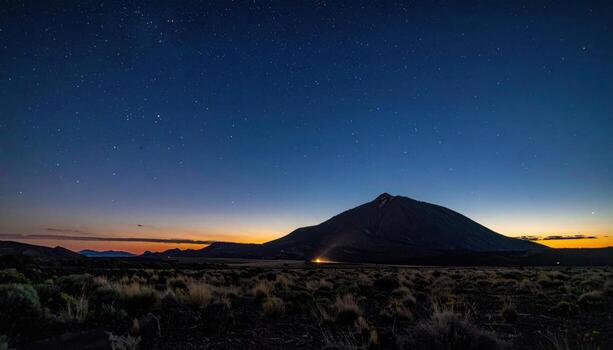 Zodiacal light faint triangular glow before dawn minimal landscape edge and vast dark copy space clean night background photo