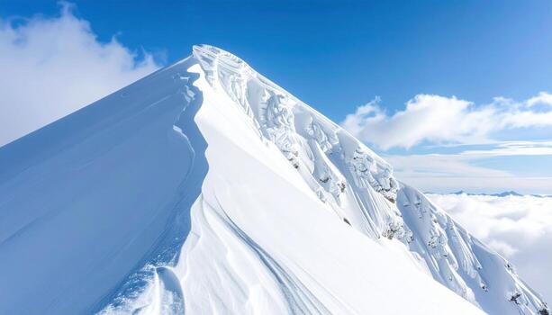 Snow cornice lines atop a ridge sculptural whites wide sky copy space representing alpine minimal form suitable for travel education weather and modern design photo