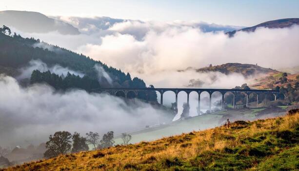 Canal aqueduct crossing valley in low cloud water plane suspended representing historic engineering and elevated waterways suitable for architecture features travel guides and infrastructure design photo