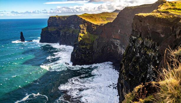Submarine canyon mouth seen from high cliff with swell lines compressing into silver ribbons representing coastal bathymetry and elegant surface patterns suitable for education features travel guides photo