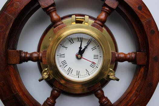 Vintage clock in the center of a round wooden frame top view stock photo
