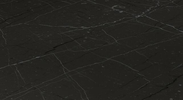 A dark gray marble surface exhibits elegant white veining, creating a sophisticated and natural stone pattern for design applications and architectural finishes. photo
