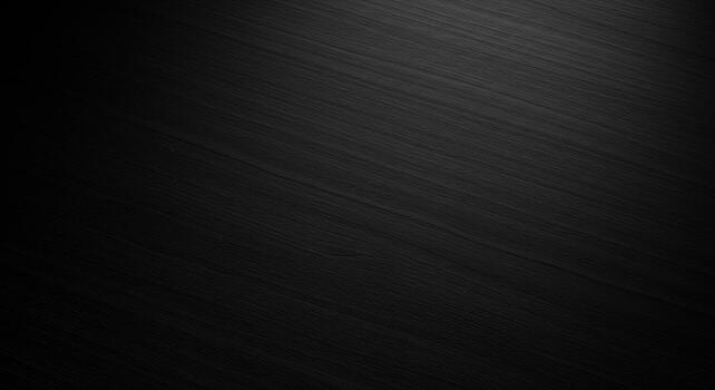 Dark brushed metal surface with diagonal lines creates a sleek and modern texture, perfect for industrial designs and sophisticated backgrounds for various uses. photo