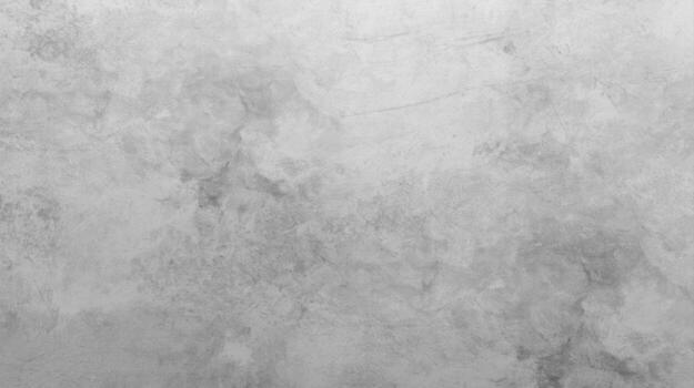 A textured gray concrete wall with subtle patterns creates a versatile and neutral background, perfect for adding depth and visual interest to designs overall. photo