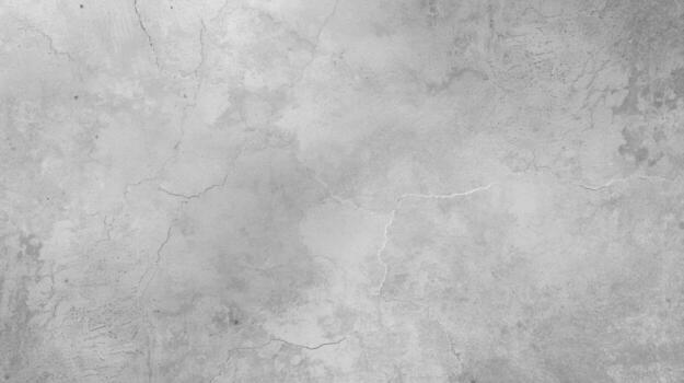 A light gray concrete wall showcases a textured surface with subtle cracks and variations, creating a versatile and neutral backdrop for various designs and artistic uses. photo