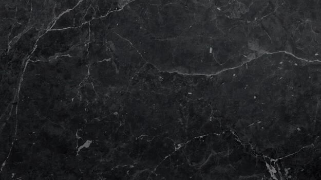 Dark grey marble texture presents a sophisticated surface with interwoven white veins creating an elegant stone pattern perfect for a modern design aesthetic. photo