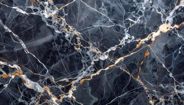 A captivating close-up showcases the intricate veins of black marble interwoven with striking gold and white patterns, creating a luxurious stone texture backdrop. photo