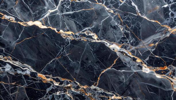 A dark, luxurious marble surface features elegant veins of gold and white, creating a sophisticated and intricate abstract pattern perfect for backgrounds and designs. photo