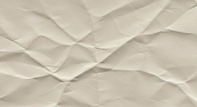 The detailed texture of the crumpled cream colored paper reveals geometric patterns and highlights the unique surface of the wrinkled sheet after being crushed up. photo