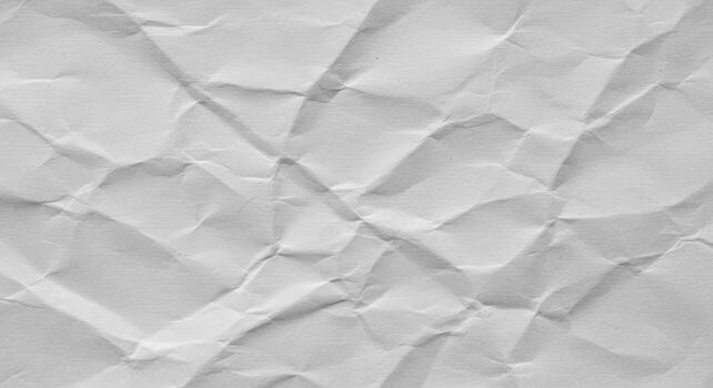 The textured surface of a crumpled white paper displays intricate patterns of folds and creases, creating a visually interesting and abstract design element. photo