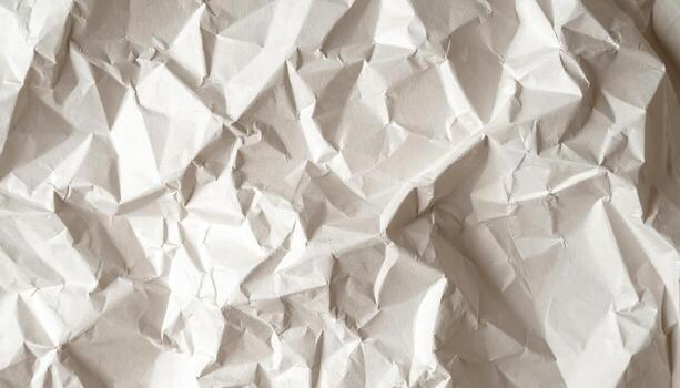 de cerca fotografía de un estropeado blanco papel superficie, exhibiendo sus intrincado pliegues y oscuridad creando un texturizado resumen modelo genial para gráfico diseño usar. foto