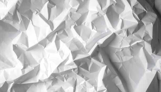 Abstract close-up of rumpled white paper with soft shadows creates a textured, versatile background perfect for adding depth to graphic designs and artwork. photo