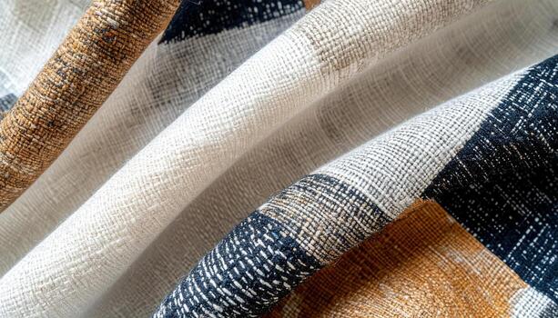 A close up shot reveals the intricate patterns and textures of a woven fabric with earthy tones and subtle geometric designs creating a warm and inviting feel. photo