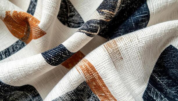 The textured fabric features a woven design with navy, brown, and white threads creating a geometric pattern, offe a rich, tactile surface for design applications. photo